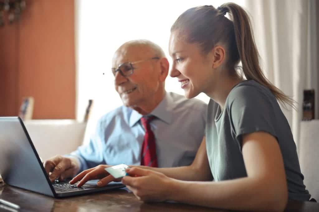 Respite care for the elderly provided by helping with online banking