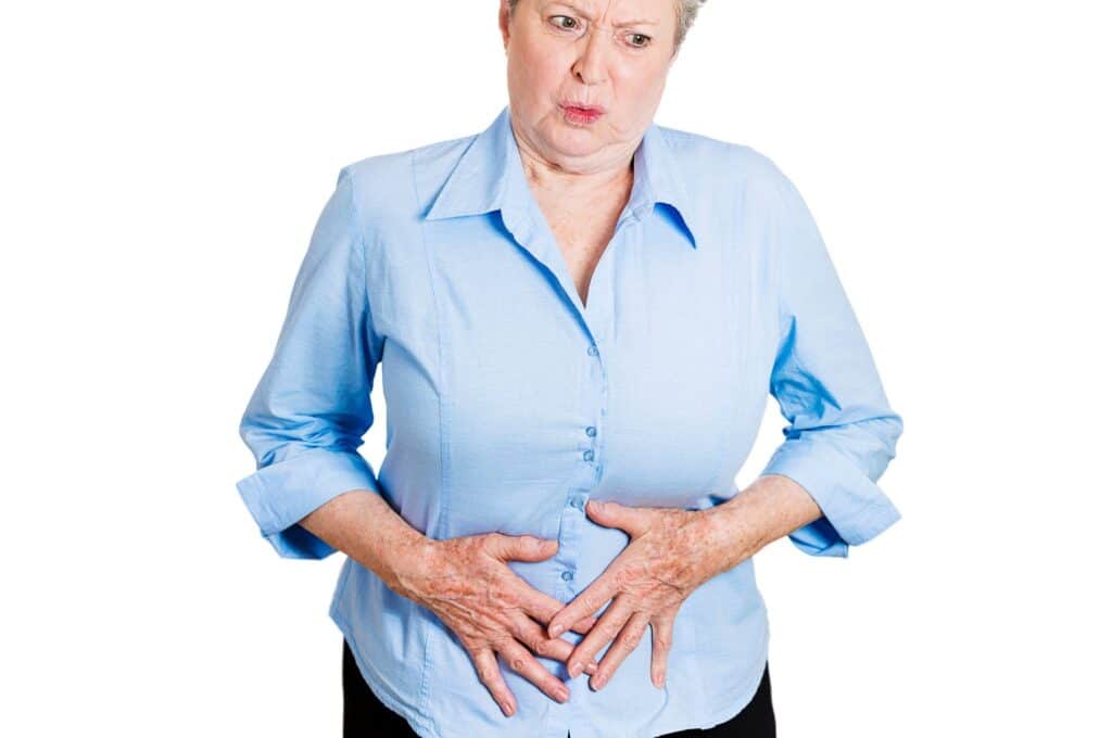 lady experiencing UTI symptoms in the elderly. 